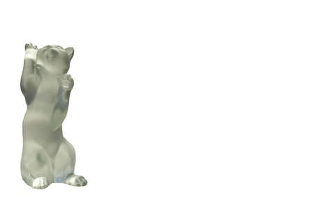 a crystal cat standing on its back legs, with lots of copy spaceの写真素材