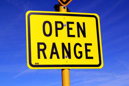 Open Range Sign - Yellow Diamond with blue backgroundの写真素材
