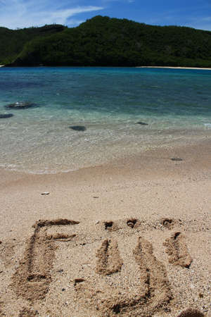 Writing in the Sand: Fiji - Beautiful beach scenery with wonderful blue and turquoise sea waterの写真素材