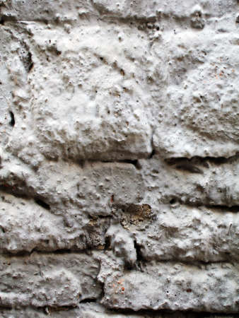 Old wall surface with concrete in white colors