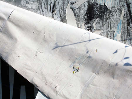 Paper on the metalic texture, street sceneの写真素材