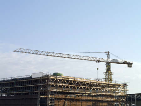 Huge new building and modern construction yardの写真素材