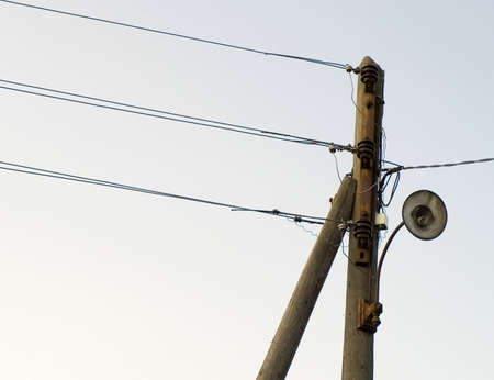 Old power wire and alone empty electric lantern