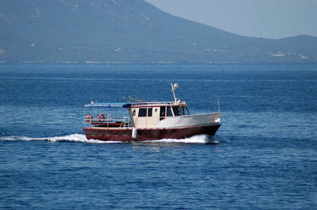 Wooden modern touristic boat in Adriatic seaの写真素材