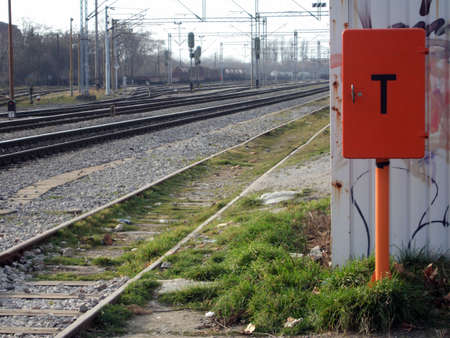 Modern railway station with trains and signの写真素材