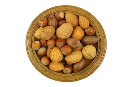 Nut mix on wooden plate isolated on white