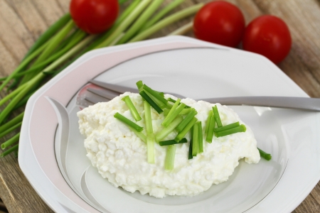 Healthy breakfast of cottage cheese with chivesの写真素材