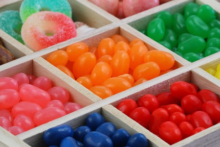Selection of jelly candies and sweets in wooden box の写真素材