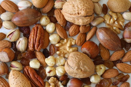 Selection of nuts, almonds and sultanas, close upの写真素材