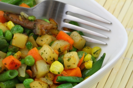 Bowl of fried mixed vegetables, close upの写真素材