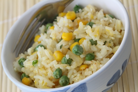 Fried rice with egg, green peas and sweetcornの写真素材