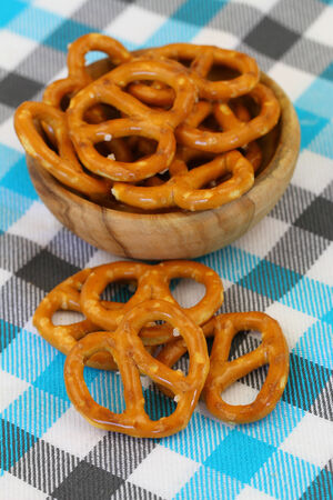 Pretzels on blue checkered surfaceの写真素材