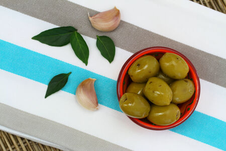 Green olives with garlicの写真素材