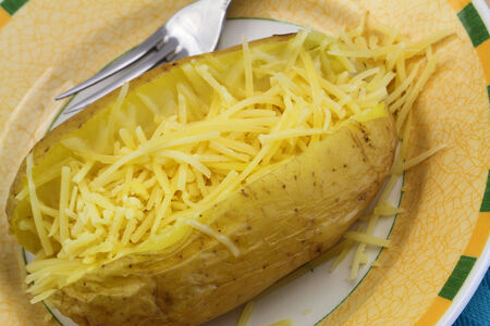 Jacket potato with cheese, close up