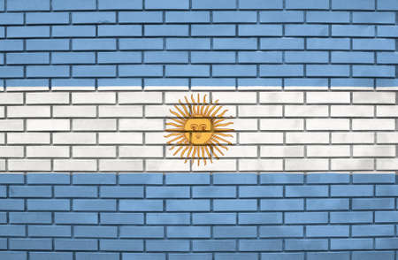 Flag of the Argentina on brick wallの写真素材