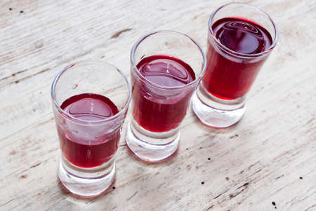 homemade wine cherry on the old boardsの写真素材