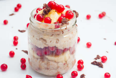 porridge with currants on a light backgroundの写真素材