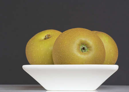 Bowl of Russet Applesの写真素材