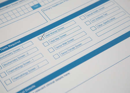 A pathology request form with a tick in the Well Woman Screen box.の写真素材