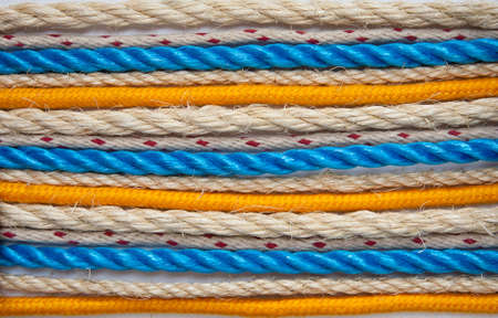 A selection of ropes arranged on a white background.の写真素材