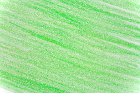 Diagonal green background made with a wax crayonの写真素材