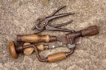 A collection of well used old tools の写真素材