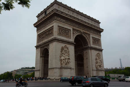 An isolated photo of the famous Arch of Triumph (Arc de Triomphe) located in Paris, France to...