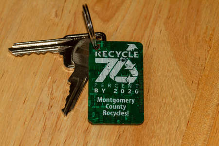 Montgomery County, MD, USA 07/12/2020: A key fob made out of recycled printed circuit board...