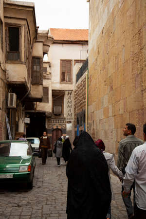 Damascus, Syria 03/28/2010: A view of a narrow street in the historic district of Damascus. The...