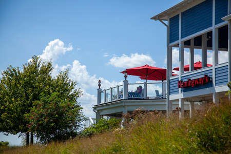 Stensville, MD, 08/18/2020: Hemingway's Restaurant located close to the Chesapeake bay bridge is an upscale seafood restaurant that offers scenic landscape view of the Bay bridge from eastern shoreのeditorial素材