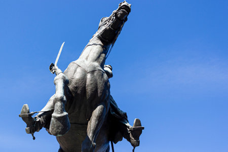 Washington DC, USA 11-29-2020: Low angle image of a bronze equiestrian statue featuring a war horse rearing with a soldier with sword in his hand. It is a demonstration of agression and cavalry charge.のeditorial素材