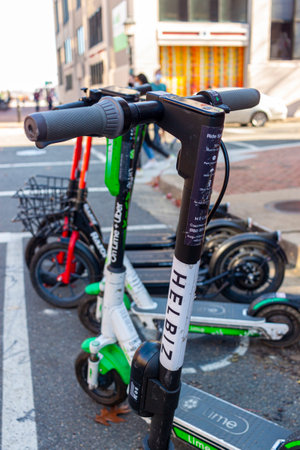 Alexandria, VA, USA 11-28-2020: Electric scooters available for rent through various ride app...