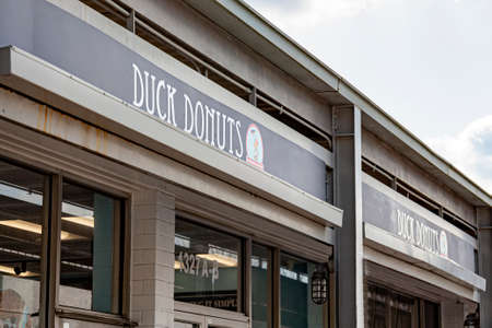 Rockville, MD, USA 03-04-2021: Outside of a branch of Duck Donuts, a famous donut shop known for its...