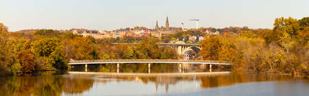 An autumn landscape panorama of Potomac river Theodore Roosevelt Island (left) and a small...
