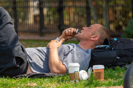 Clarksburg, MD, USA 04-07-2021: shopping cart filled with computer parts including RAM memory cards and a hard drive. Shopping for technology, consumer electronics, upgrading computer themes.のeditorial素材