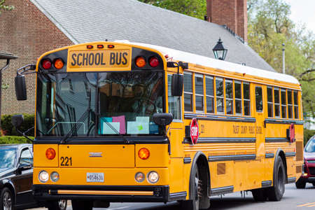 Easton, MD, USA 04-16-2021: A yellow Thomas School bus operated by Talbot County Public School...