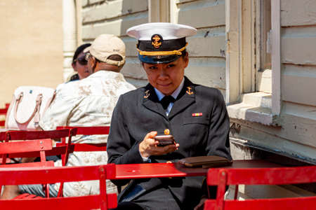 Annapolis, MD, USA 05-02-2021: A young Asian American female cadet training at the US Naval Academy...