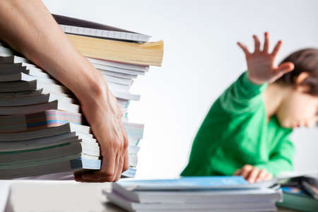 Ambitious parenting with high academic achievement expectations from kids concept. A mother is...