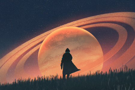 night scene of the man standing on field against the planet with rings, illustration paintingの写真素材