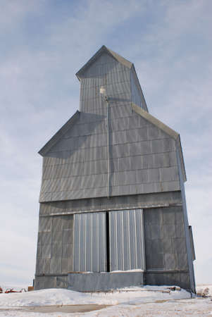 Solitary Grain Elevator on Frozen Prairieの写真素材