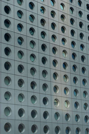 Beam of light on side of office building.の写真素材