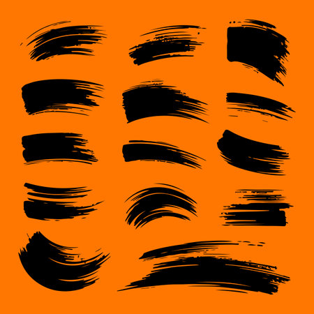 Set of Ink brush stroke silhouettes in various shapes and sizesのイラスト素材