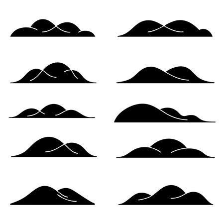 A collection of distinct mountain range shapes presented as black silhouettes on a clean white background.のイラスト素材
