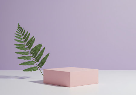 A simple pink display pedestal sits on a white surface next to a delicate green fern leaf, set against a soft purple backdrop.の素材