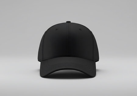 A clean studio photograph showcases a plain black baseball cap from a direct front perspective against a neutral background.の素材