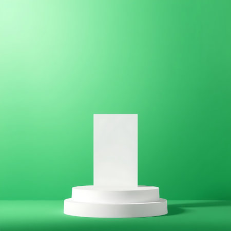 A clean white podium stands on a green surface, creating a simple and elegant presentation space for products or ideas.の素材