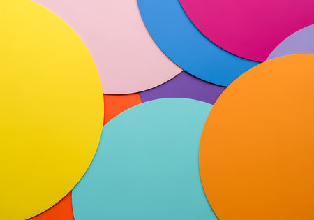 A close-up view of overlapping, organic shapes in bright, contrasting colors creating a dynamic abstract pattern.の素材