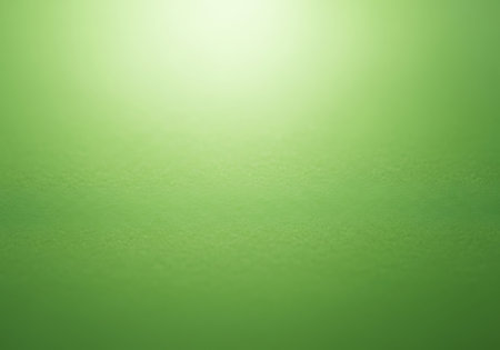 A digital artwork featuring a smooth gradient of green tones, composed of tiny squares, illuminated by a bright light source from above.の素材