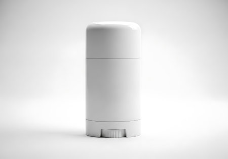 A clean, modern white cylindrical object stands against a stark white background, showcasing its minimalist design.の素材