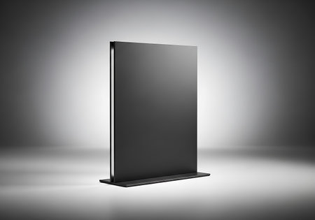 A minimalist dark gray display stand is illuminated by a soft spotlight, creating a sophisticated and modern presentation.の素材